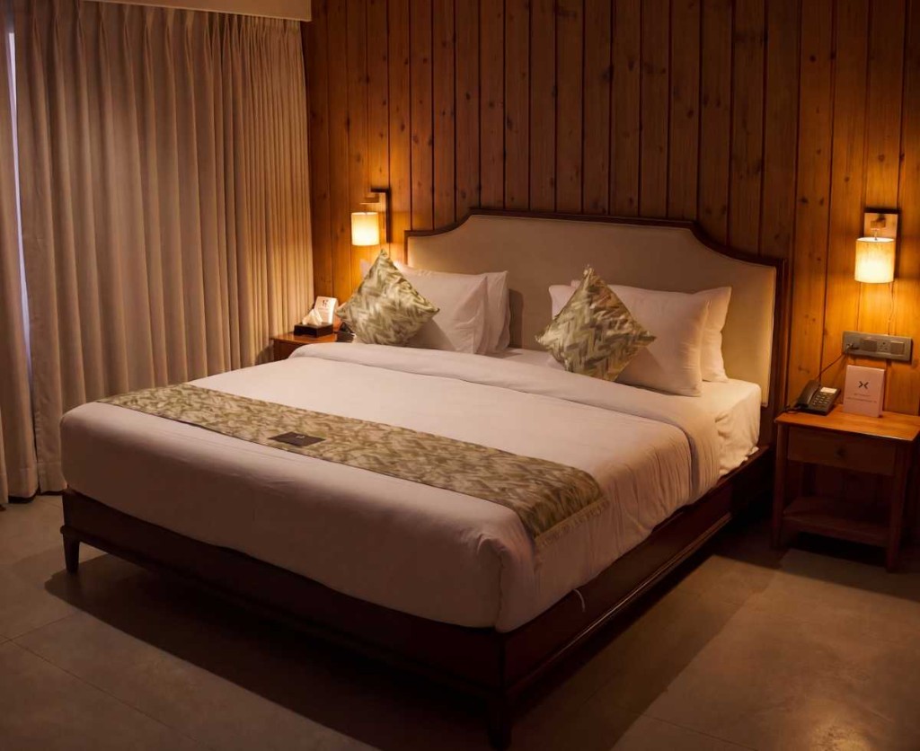 3 BHK villa bedroom with wood-paneled wall