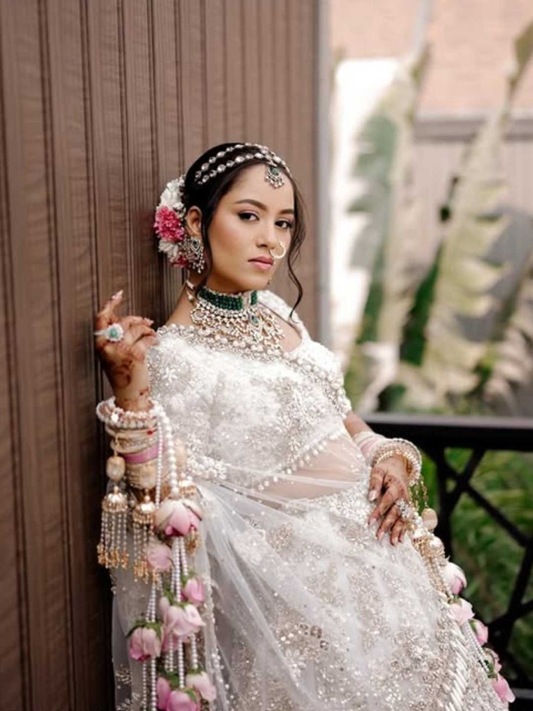 Bride in ornate traditional jewelry at Beverly Hills Resort
