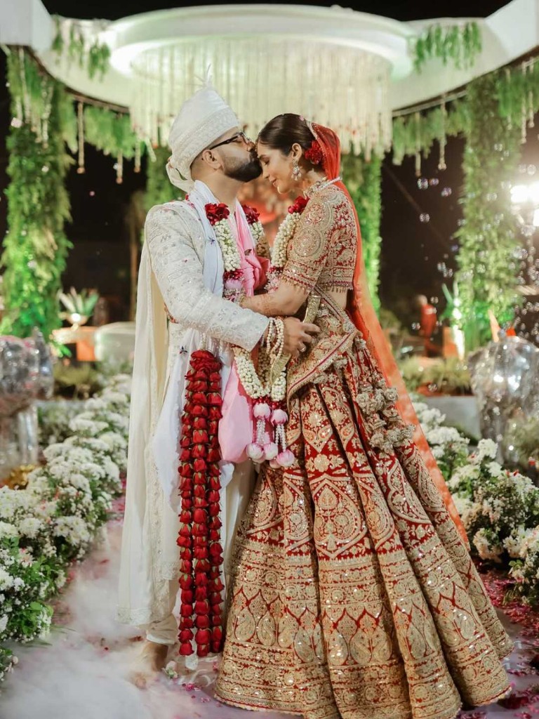Bride and groom during an evening wedding ceremony at Beverly Hills
