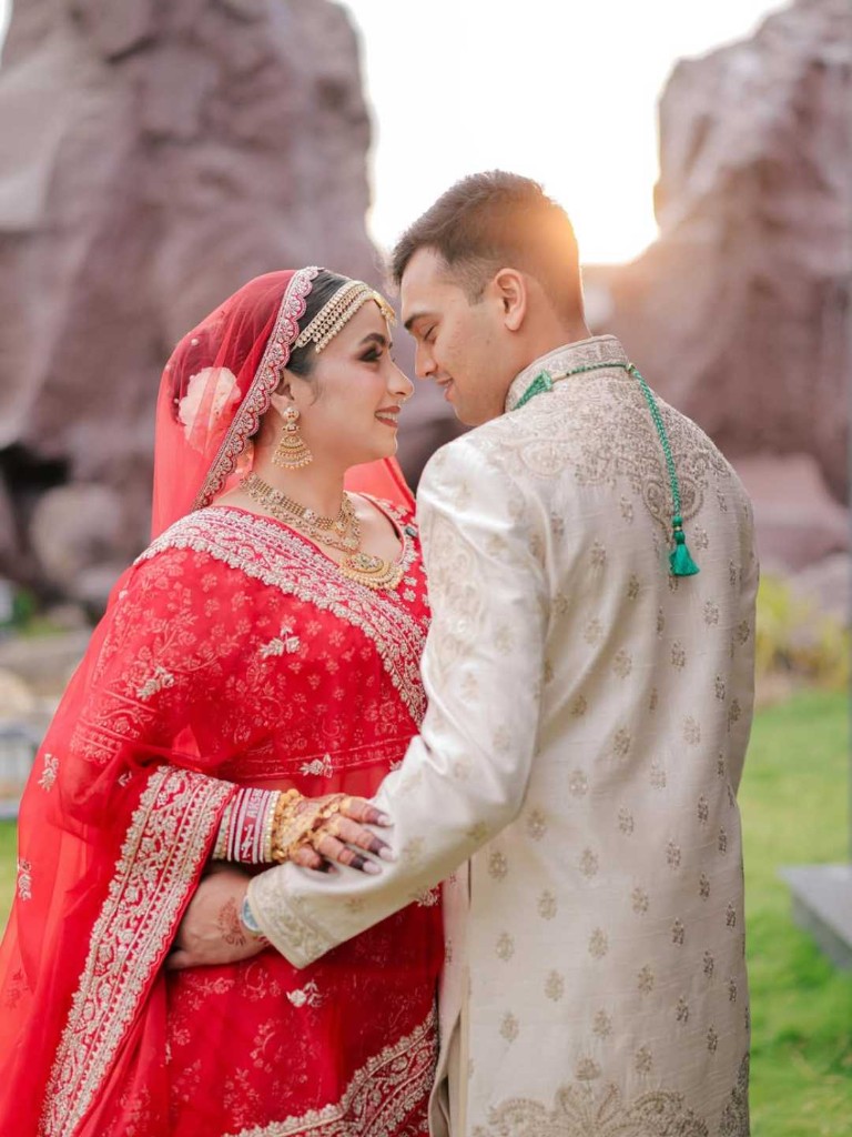 Bride and groom in traditional wedding attire at Beverly Hills